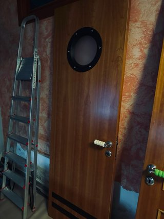 Porta battente da interno ciliegio con oblò