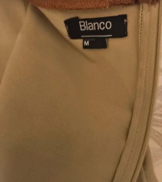 Vestido beige con adornos marrones