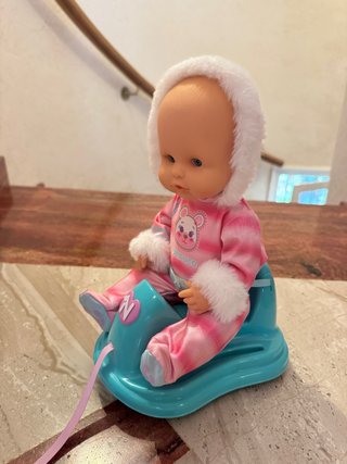 Muñeca Nenuco con trineo y tirador