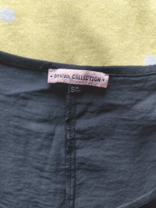 Blusa Bershka negra talla S con bolsillo