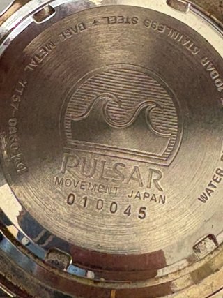 Reloj Pulsar Kinetic Plata y Blanco