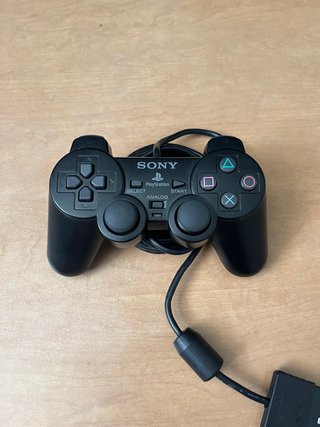 PlayStation 2 Slim + Gioco e accessori