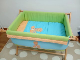 Minicuna bebé con jirafas