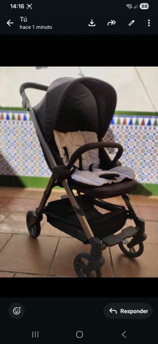 Carrito de bebé con funda y saco