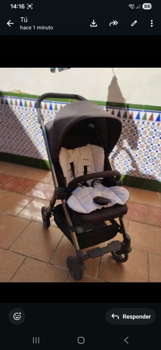 Carrito de bebé con funda y saco