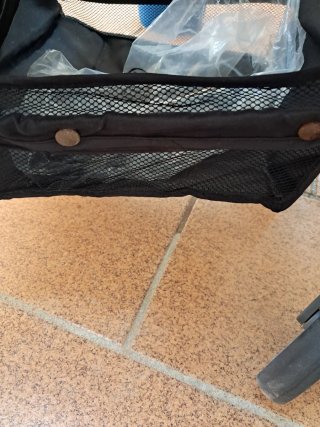 Carrito de bebé con funda y saco