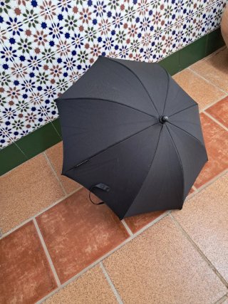 Carrito de bebé con funda y saco