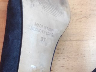 Zapatos de salón azul con lazo