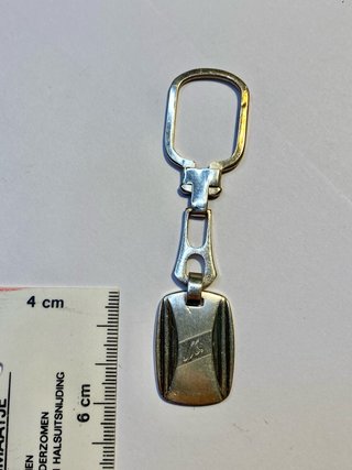 Portachiavi art déco in argento 925 con incisione