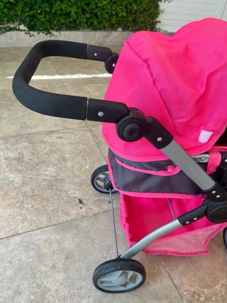 Cochecito de muñecas rosa y gris