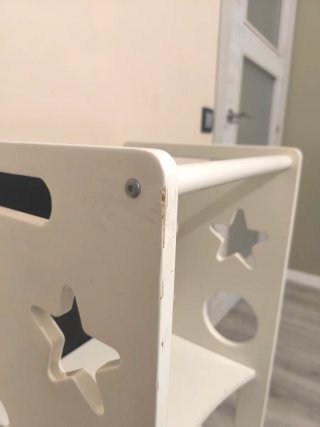 Torre de aprendizaje infantil con pizarra
