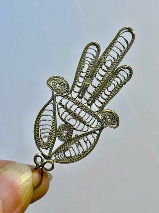 Mano di Fatima artigianale in filo d’argento 1000