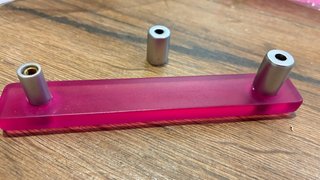 2 Pomos de plástico rosa y metal