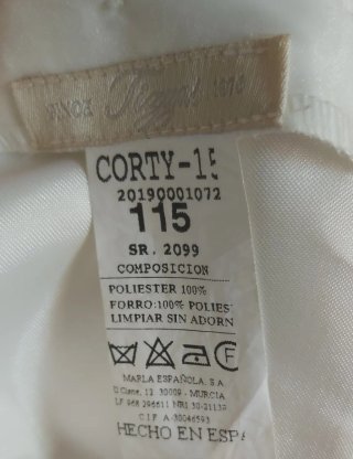 Vestido de comunión blanco con lazo rosa y cancan