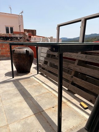 Tavolo in cristallo e ferro nero