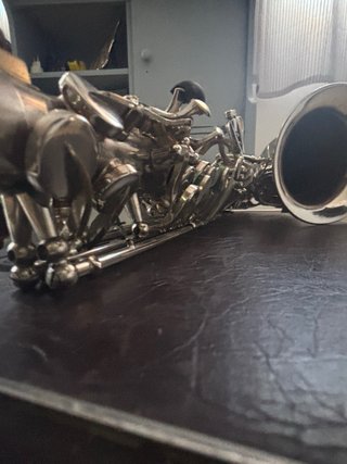 Saxofón Alto H. Suzuki Como Nuevo