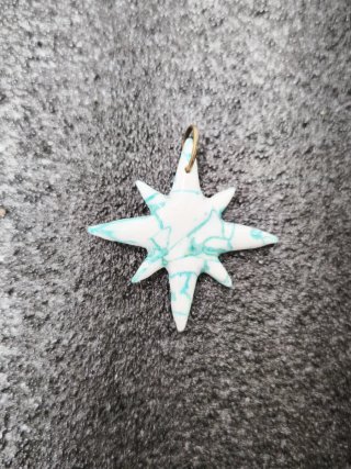 Colgante estrella arcilla polimérica hecho a mano