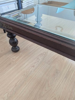 Mesa de centro antigua de madera y cristal
