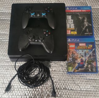 PS4 Slim 1TB + 2 Giochi + 2 Controller