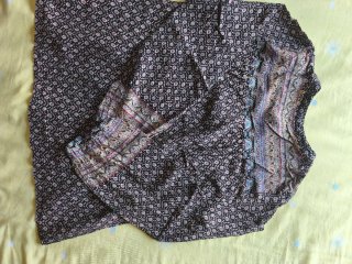 Blusa October manga larga estampada