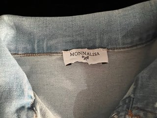 Chaqueta vaquera con encaje y lazos