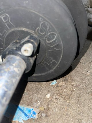 Barra de pesas con discos