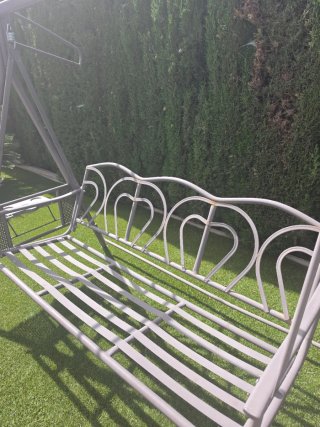 Balancín de forja para jardín
