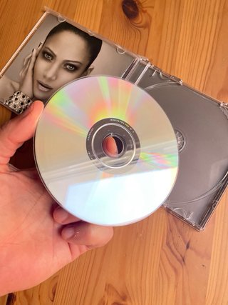 CD Jennifer Lopez - Como Ama Una Mujer