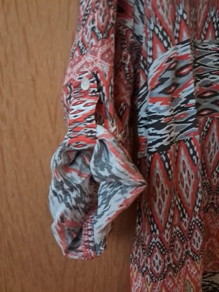Blusón estampado manga extensible