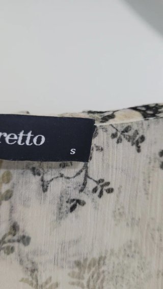 Blusa Tintoretto floral manga larga con top .