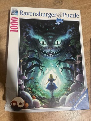2 Puzzles Ravensburger y Educa: París y Alicia