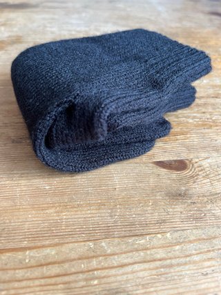 Guantes negros de punto