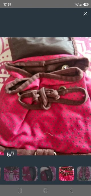 Mochila rosa con detalles marrones