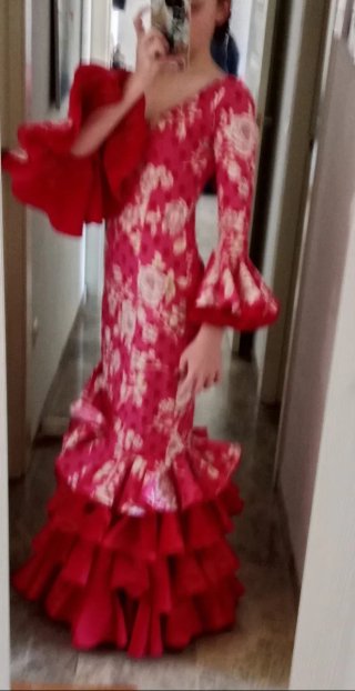 Vestido de gitana rosa con volantes