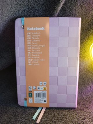Neón silueta de Unicornio,una agenda y una libreta