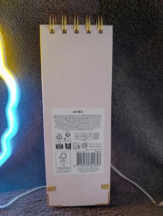 Neón silueta de Unicornio,una agenda y una libreta