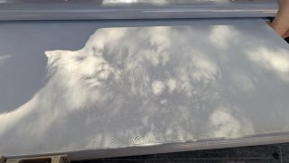 Toldo retráctil gris para exterior