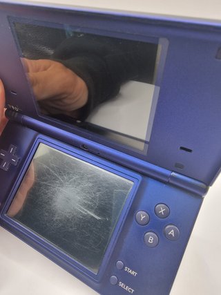 Nintendo DSi Blu funzionante con caricatore