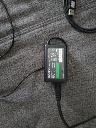 PSP 1004 Blanca + Juego Piratas del Caribe