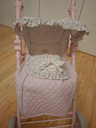 Sillita de paseo para muñecas rosa