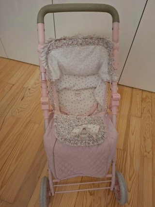 Sillita de paseo para muñecas rosa