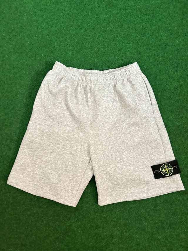 Conjunto Stone Island Rosa y Gris