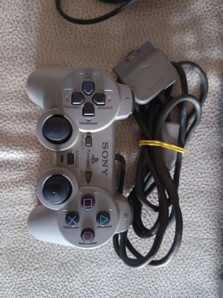 PlayStation 1 Sony Silver con joystick