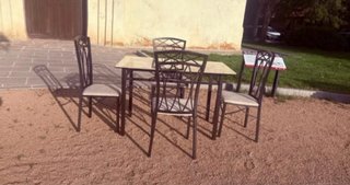 Mesa cristal exterior con 4 sillas metal