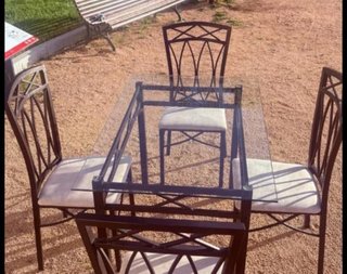 Mesa cristal exterior con 4 sillas metal