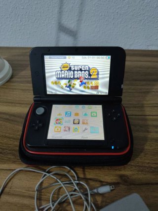 Nintendo 3DS XL Blu con custodia e caricabatterie originali