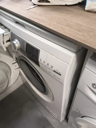 Soporte cesta lavadora