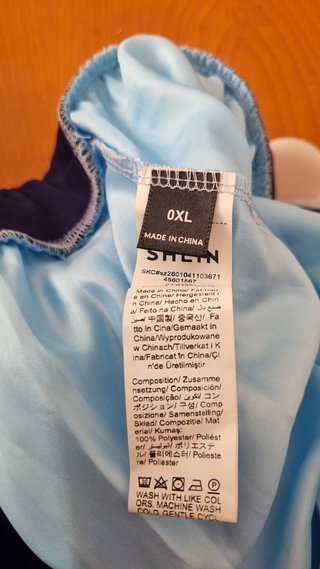 Falda tul azul botones dorados