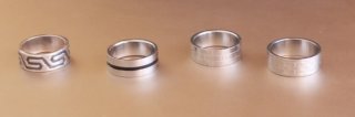Lote 4 Anillos Plata y Negro. Acero