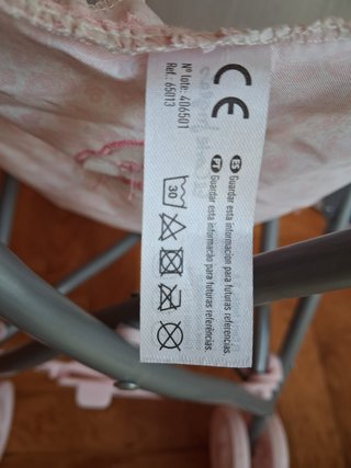 Carrito de muñecas rosa